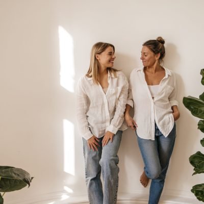 two-cute-caucasian-young-women-shirt-jeans-looking-each-other-posing-white-background-concept-human-emotions-facial-expressions